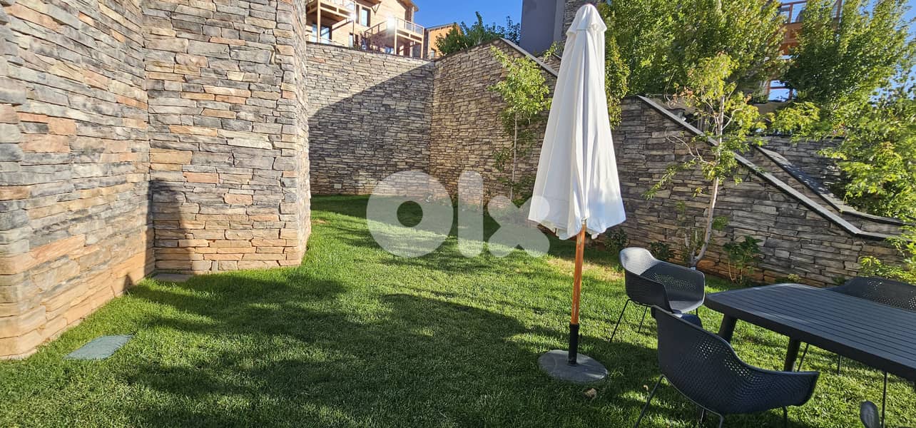 RWK197GZ - Triplex Chalet For Sale In Tilal Faqra With Garden 2