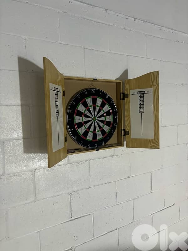 dart board with wood house 3