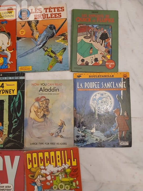 14 livres bandes dessinees en francais, tintin, asterix, quick, chick 0