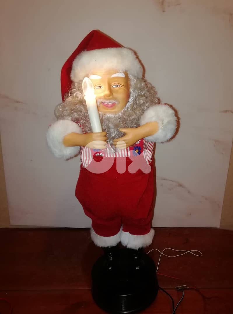 Animated Santa with music & light works on 2 D size batteries size 50 0