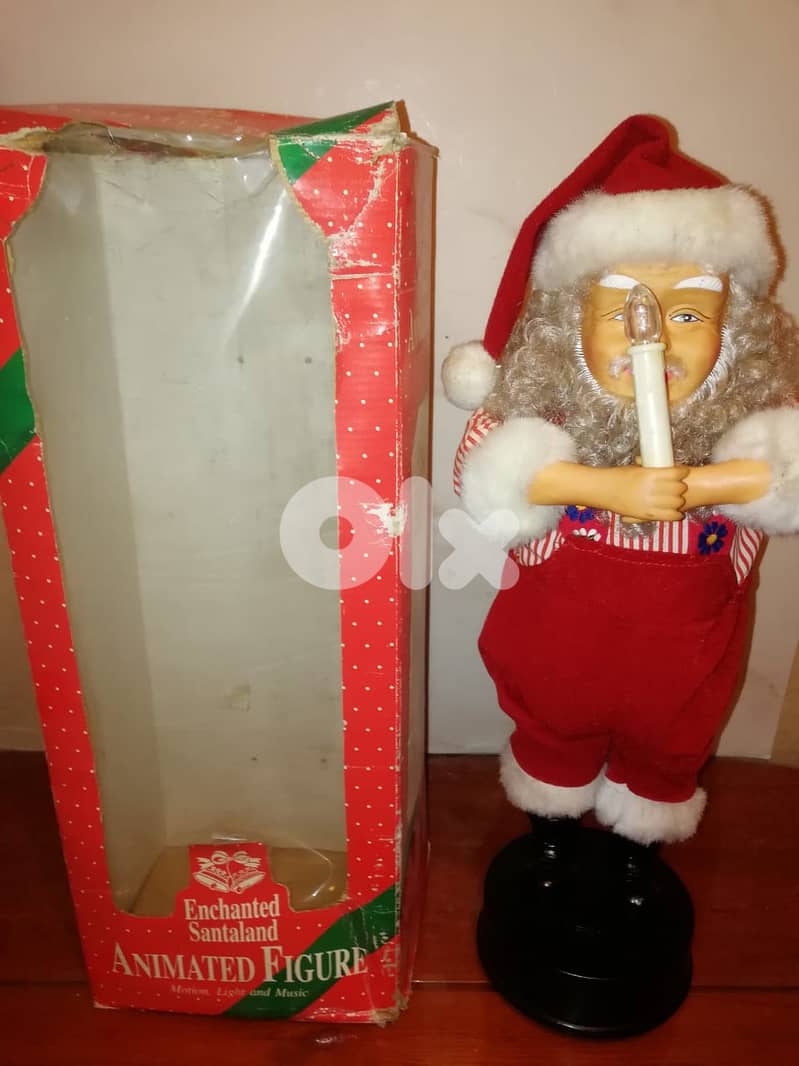 Animated Santa with music & light works on 2 D size batteries size 50 1
