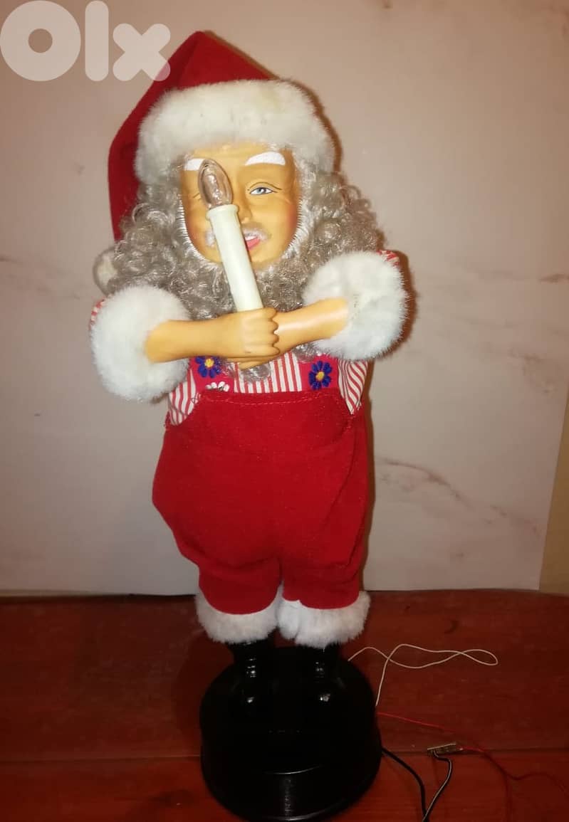 Animated Santa with music & light works on 2 D size batteries size 50 3