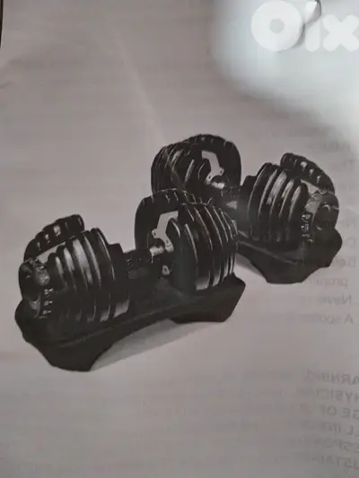 Bowflex adjustable NEW 24 & 42 kg for 220$