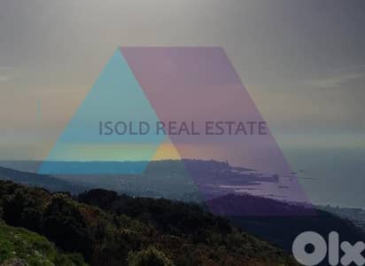 A 1200m2 Land having an open mountain/sea view for sale in Mar Chaaya