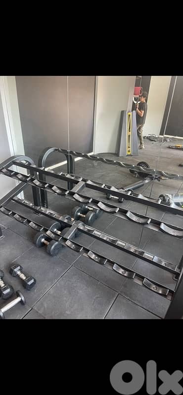 Rack for dumbells like new 220$ 1