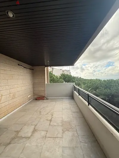 Spacious apartment for rent in Dik el Mehdi with open views.