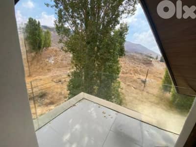 Chalet for sale in Tilal Al Aassal/ Triplex/ View/ Furnished