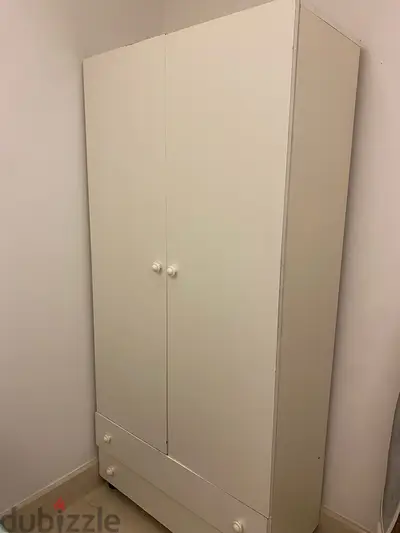 double door closet with 2 drawer