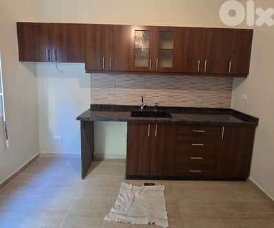 L16616-Apartment for Rent in Edde, Jbeil with a Small Garden