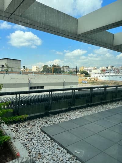 Industrial open space office with garden and terrace