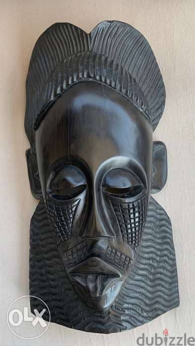 Ebony wood . handmade African mask 0