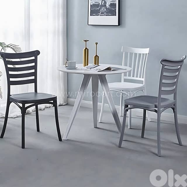 Minimalist Nordic Dining Chairs with Curved Backrest & Sleek Finish 1