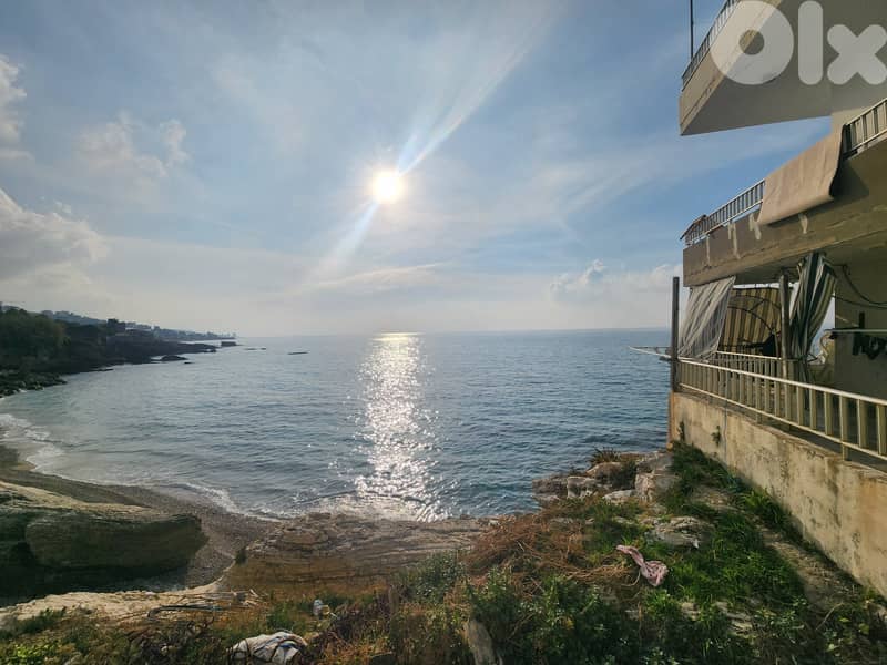 RWB244EA - Land for sale in Halat Jbeil with an old building 0