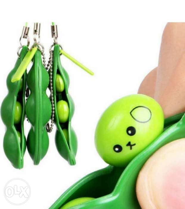 2 in 1 keychain and cute fidget pop out squeeze 3$ 1