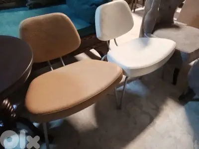 2 synthetic leather lounge chairs