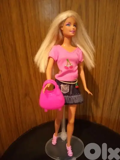 Barbie Mattel wearing As new doll bend legs+Shoes+Bag=25$