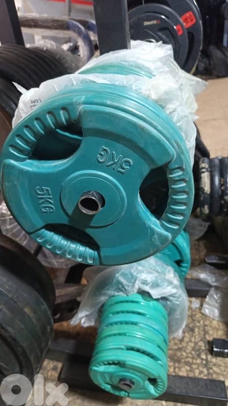 colored rubber plates for normal axe 1 kilo 2,5$ 2