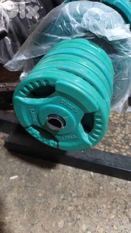 colored rubber plates for normal axe 1 kilo 2,5$ 3