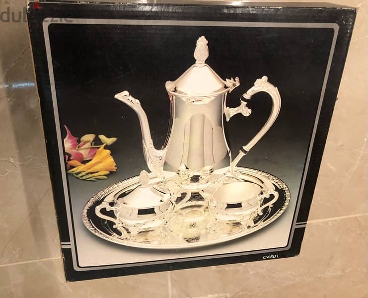 antiques & collectibles set  ،إبريق،  أنتيك ، صواني، تخت، طاولة، فضّة 16