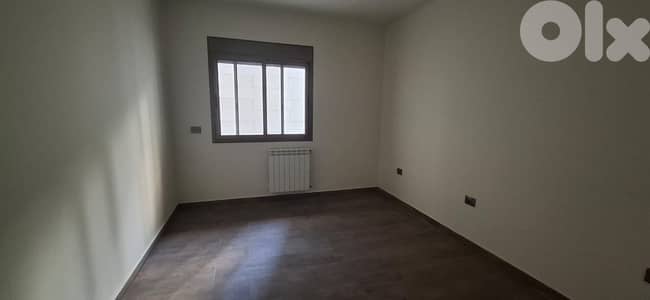 L17220 - Spacious Apartment with Terrace For Sale in Naccache