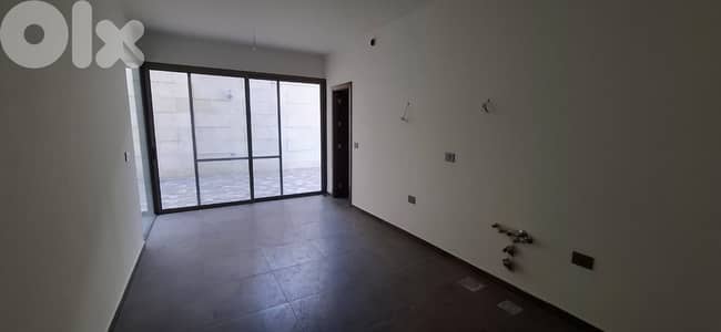 L17220 - Spacious Apartment with Terrace For Sale in Naccache