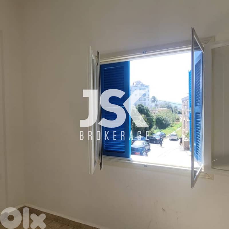 L17465 - Apartment With An Amazing View For Rent in Jbeil Souks 0