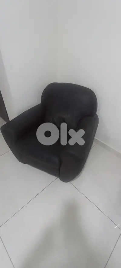Dark brown leather armchair