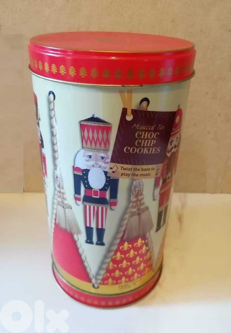 Christmas deco. Rotating musical tin biscuit box nutcracker 22cm 0