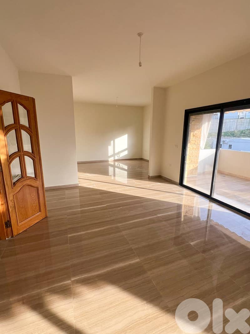220 SQM Prime Location Apartment in Aoukar, Metn 0