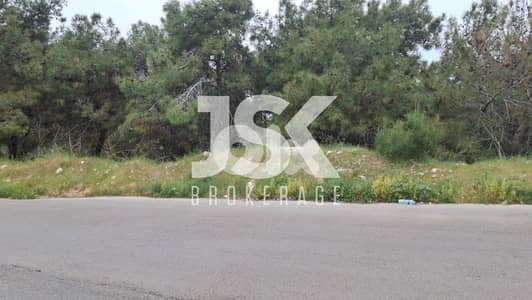 L17671-Spacious Land With Seaview For Sale in Bsalim