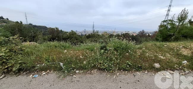 L17671-Spacious Land With Seaview For Sale in Bsalim