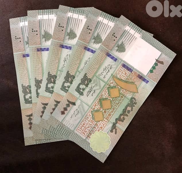 Consecutive banknotes 1000L 0