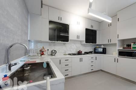 Renovated Apartment for sale in Established 40-Year-Old Building
