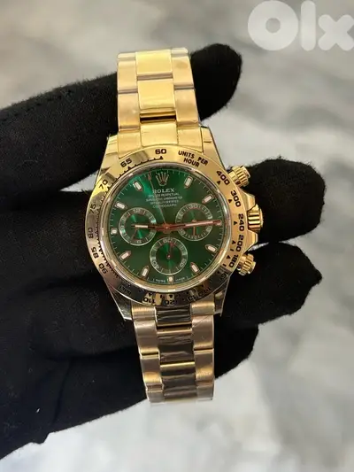 Rolex gold daytona