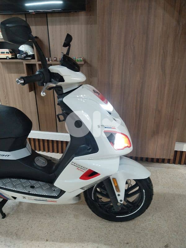 Peujeot speedfight 4 Total sport 125cc  injection water coolant CBS 2
