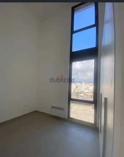 Lofty living with shared pool and gym