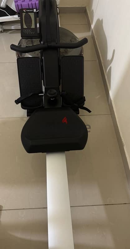 rowing machine + punch box + dumbles and axe 0