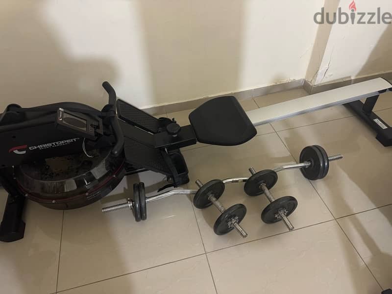 rowing machine + punch box + dumbles and axe 5