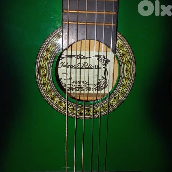 Guitar (Un Quart) good condition for sale 1
