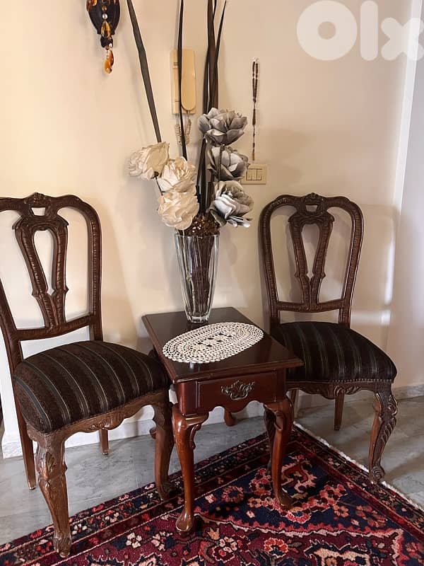 2 chairs and a table 0