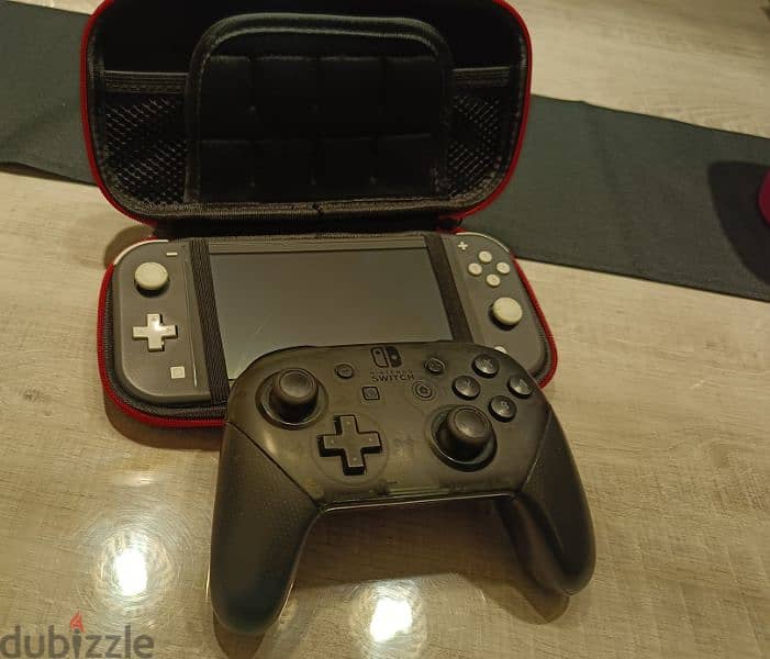 Nintendo Switch Lite + Switch Pro Controller 0