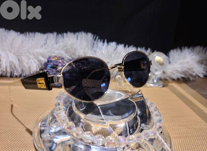 MIU MIU luxurious sunglasses 0