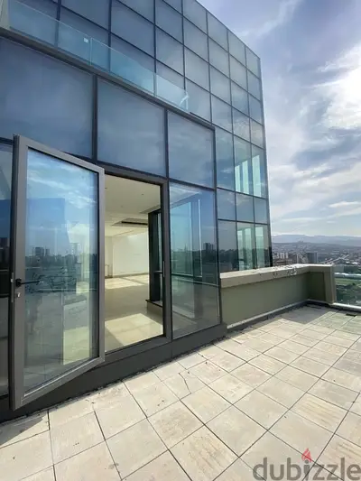 High ceiling duplex lofty with large terrace garden