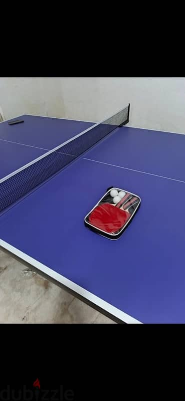 ping pong table (with rackets and balls) 2