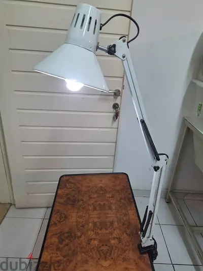 Lighting movable on table