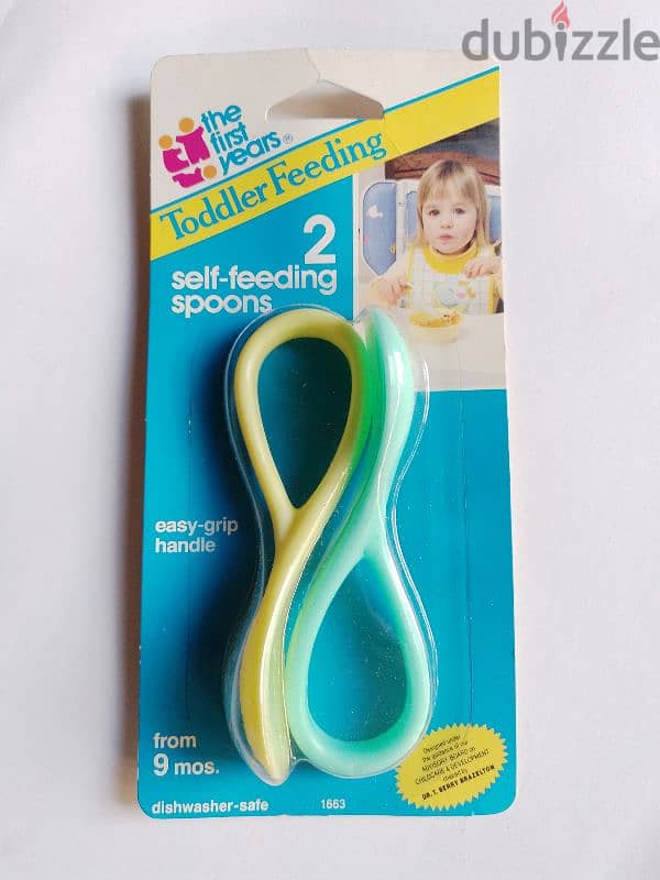 2 self - feeding spoons 0