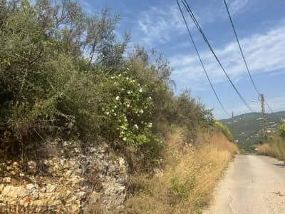 2025 m2 land + open mountain view for sale in Aamchit - عمشيت