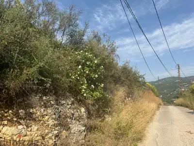 2025 m2 land + open mountain view for sale in Aamchit - عمشيت