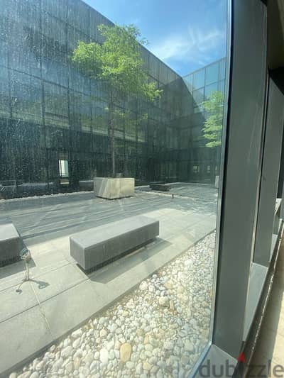 Brand new high scale office open space with shared garden