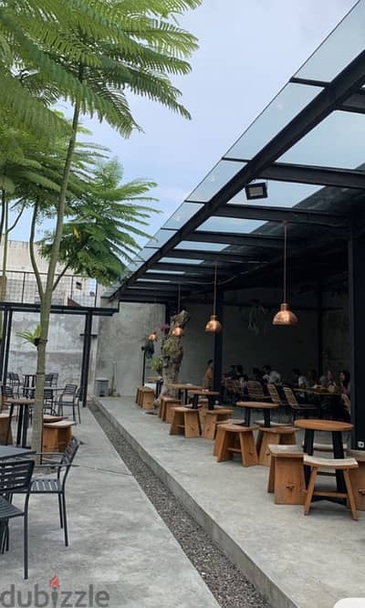 Branded industrial desig lounge with terrace mar mikhael